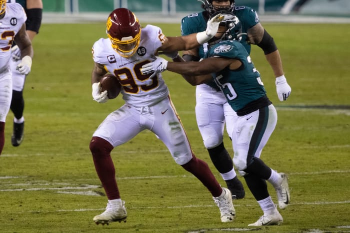 Chase Young Ball Arm © Bill Streicher  2021 Jan 3